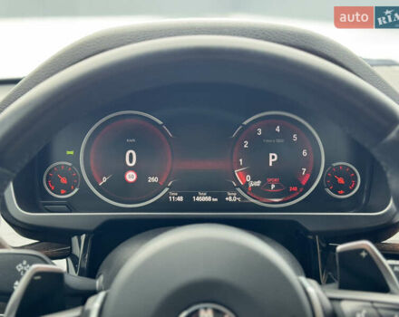 Черный БМВ Х5, объемом двигателя 3 л и пробегом 146 тыс. км за 25950 $, фото 24 на Automoto.ua