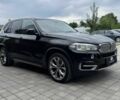 Чорний БМВ Х5, об'ємом двигуна 3 л та пробігом 73 тис. км за 11000 $, фото 1 на Automoto.ua