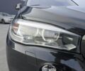 Чорний БМВ Х5, об'ємом двигуна 2 л та пробігом 152 тис. км за 33990 $, фото 1 на Automoto.ua