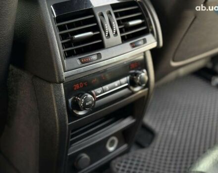 Черный БМВ Х5, объемом двигателя 3 л и пробегом 113 тыс. км за 24900 $, фото 13 на Automoto.ua