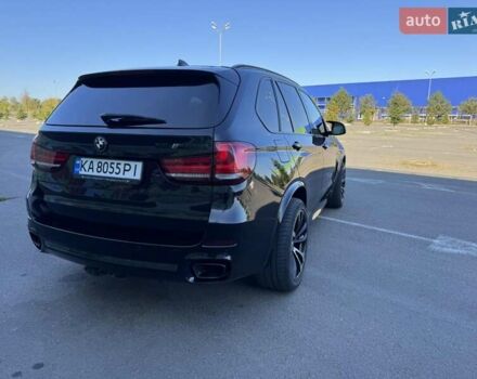 Черный БМВ Х5, объемом двигателя 3 л и пробегом 300 тыс. км за 30000 $, фото 2 на Automoto.ua