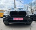 Чорний БМВ Х5, об'ємом двигуна 3 л та пробігом 168 тис. км за 19100 $, фото 2 на Automoto.ua