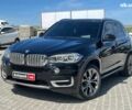 Черный БМВ Х5, объемом двигателя 3 л и пробегом 150 тыс. км за 23690 $, фото 1 на Automoto.ua