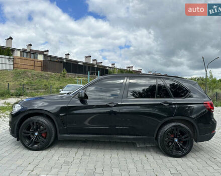 Черный БМВ Х5, объемом двигателя 3 л и пробегом 230 тыс. км за 24500 $, фото 1 на Automoto.ua
