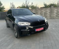 Чорний БМВ Х5, об'ємом двигуна 3 л та пробігом 320 тис. км за 25950 $, фото 4 на Automoto.ua