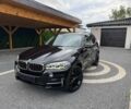 Чорний БМВ Х5, об'ємом двигуна 3 л та пробігом 120 тис. км за 18000 $, фото 1 на Automoto.ua