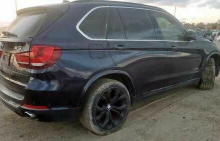 Черный БМВ Х5, объемом двигателя 3 л и пробегом 174 тыс. км за 9638 $, фото 2 на Automoto.ua