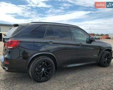 Чорний БМВ Х5, об'ємом двигуна 3 л та пробігом 99 тис. км за 7395 $, фото 2 на Automoto.ua