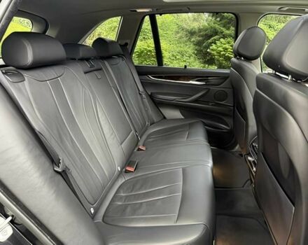 Чорний БМВ Х5, об'ємом двигуна 3 л та пробігом 75 тис. км за 25000 $, фото 15 на Automoto.ua