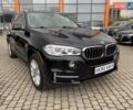 Чорний БМВ Х5, об'ємом двигуна 3 л та пробігом 105 тис. км за 19950 $, фото 1 на Automoto.ua