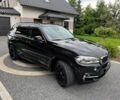 Чорний БМВ Х5, об'ємом двигуна 3 л та пробігом 120 тис. км за 18000 $, фото 2 на Automoto.ua