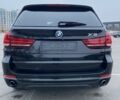 Черный БМВ Х5, объемом двигателя 3 л и пробегом 175 тыс. км за 25990 $, фото 5 на Automoto.ua