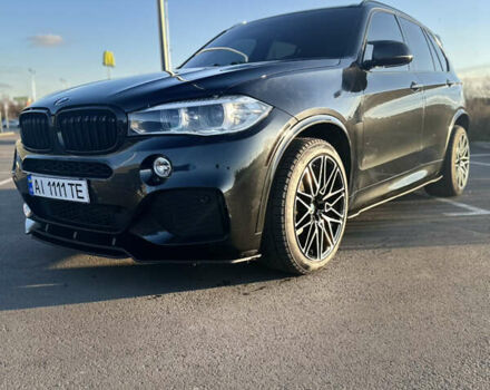 Черный БМВ Х5, объемом двигателя 3 л и пробегом 178 тыс. км за 34500 $, фото 1 на Automoto.ua