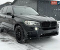 Чорний БМВ Х5, об'ємом двигуна 2.98 л та пробігом 178 тис. км за 19500 $, фото 6 на Automoto.ua