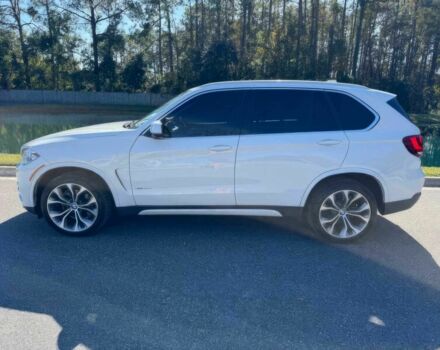 Чорний БМВ Х5, об'ємом двигуна 3 л та пробігом 73 тис. км за 14600 $, фото 4 на Automoto.ua