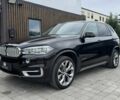 Чорний БМВ Х5, об'ємом двигуна 3 л та пробігом 73 тис. км за 11000 $, фото 1 на Automoto.ua