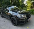 Чорний БМВ Х5, об'ємом двигуна 3 л та пробігом 115 тис. км за 30990 $, фото 2 на Automoto.ua
