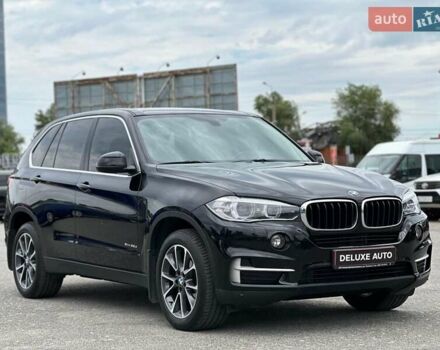 Чорний БМВ Х5, об'ємом двигуна 2 л та пробігом 148 тис. км за 26999 $, фото 1 на Automoto.ua