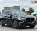 Чорний БМВ Х5, об'ємом двигуна 2 л та пробігом 148 тис. км за 26999 $, фото 1 на Automoto.ua