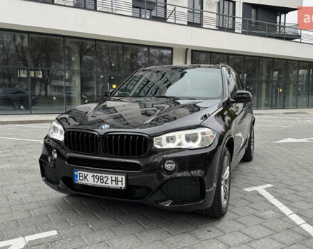 Чорний БМВ Х5, об'ємом двигуна 3 л та пробігом 144 тис. км за 32000 $, фото 4 на Automoto.ua