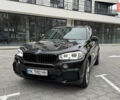Чорний БМВ Х5, об'ємом двигуна 3 л та пробігом 144 тис. км за 32000 $, фото 4 на Automoto.ua