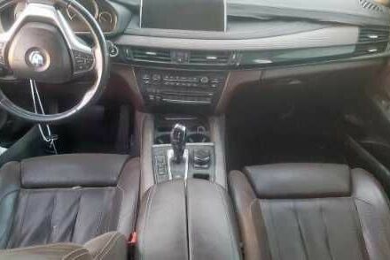 Черный БМВ Х5, объемом двигателя 3 л и пробегом 174 тыс. км за 9638 $, фото 3 на Automoto.ua