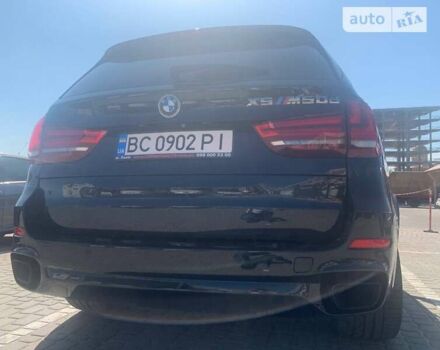 Чорний БМВ Х5, об'ємом двигуна 3 л та пробігом 233 тис. км за 31500 $, фото 1 на Automoto.ua