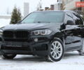 Черный БМВ Х5, объемом двигателя 3 л и пробегом 175 тыс. км за 29700 $, фото 1 на Automoto.ua