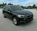 Черный БМВ Х5, объемом двигателя 3 л и пробегом 76 тыс. км за 11900 $, фото 1 на Automoto.ua