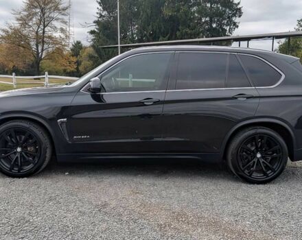 Черный БМВ Х5, объемом двигателя 3 л и пробегом 72 тыс. км за 16500 $, фото 3 на Automoto.ua