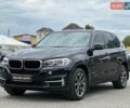 Чорний БМВ Х5, об'ємом двигуна 2 л та пробігом 148 тис. км за 26999 $, фото 1 на Automoto.ua