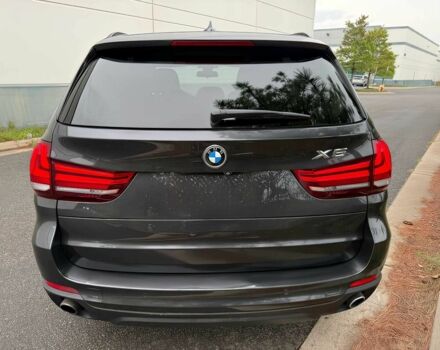 Черный БМВ Х5, объемом двигателя 3 л и пробегом 74 тыс. км за 5600 $, фото 5 на Automoto.ua