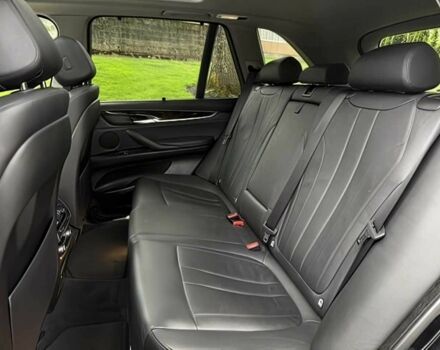 Чорний БМВ Х5, об'ємом двигуна 3 л та пробігом 75 тис. км за 25000 $, фото 14 на Automoto.ua