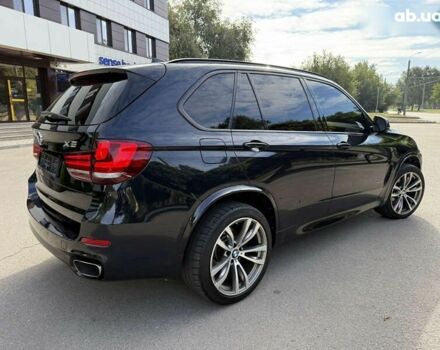 Черный БМВ Х5, объемом двигателя 3 л и пробегом 113 тыс. км за 24900 $, фото 3 на Automoto.ua