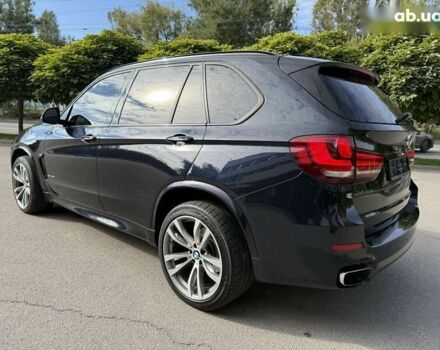 Черный БМВ Х5, объемом двигателя 3 л и пробегом 113 тыс. км за 24900 $, фото 4 на Automoto.ua