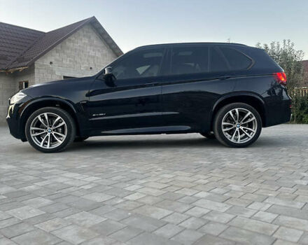 Чорний БМВ Х5, об'ємом двигуна 3 л та пробігом 320 тис. км за 25950 $, фото 47 на Automoto.ua