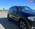 Черный БМВ Х5, объемом двигателя 2 л и пробегом 183 тыс. км за 22900 $, фото 1 на Automoto.ua