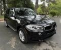 Чорний БМВ Х5, об'ємом двигуна 3 л та пробігом 75 тис. км за 25000 $, фото 1 на Automoto.ua