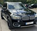 Черный БМВ Х5, объемом двигателя 3 л и пробегом 195 тыс. км за 35153 $, фото 1 на Automoto.ua