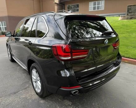 Чорний БМВ Х5, об'ємом двигуна 3 л та пробігом 75 тис. км за 25000 $, фото 6 на Automoto.ua