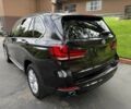 Чорний БМВ Х5, об'ємом двигуна 3 л та пробігом 75 тис. км за 25000 $, фото 6 на Automoto.ua