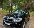 Черный БМВ Х5, объемом двигателя 3 л и пробегом 240 тыс. км за 18500 $, фото 1 на Automoto.ua