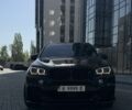 Чорний БМВ Х5, об'ємом двигуна 3 л та пробігом 74 тис. км за 42999 $, фото 1 на Automoto.ua