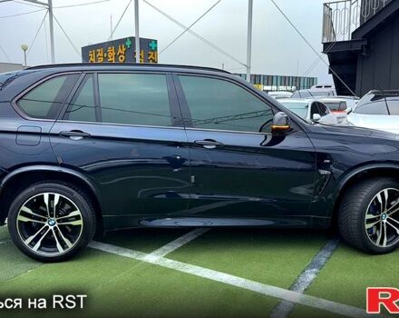 Чорний БМВ Х5, об'ємом двигуна 3 л та пробігом 200 тис. км за 29450 $, фото 4 на Automoto.ua