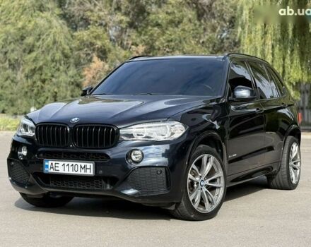 Черный БМВ Х5, объемом двигателя 3 л и пробегом 113 тыс. км за 24900 $, фото 1 на Automoto.ua
