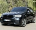 Черный БМВ Х5, объемом двигателя 3 л и пробегом 113 тыс. км за 24900 $, фото 1 на Automoto.ua