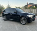 Чорний БМВ Х5, об'ємом двигуна 3 л та пробігом 320 тис. км за 25950 $, фото 2 на Automoto.ua