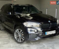 Черный БМВ Х5, объемом двигателя 3 л и пробегом 218 тыс. км за 33999 $, фото 1 на Automoto.ua