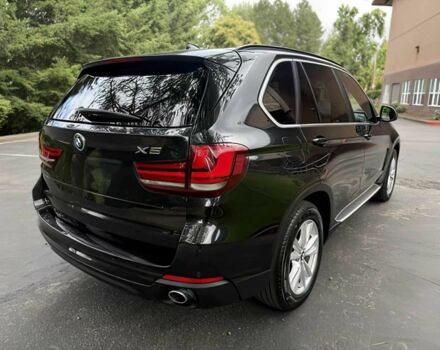Чорний БМВ Х5, об'ємом двигуна 3 л та пробігом 75 тис. км за 25000 $, фото 4 на Automoto.ua