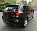 Чорний БМВ Х5, об'ємом двигуна 3 л та пробігом 75 тис. км за 25000 $, фото 4 на Automoto.ua
